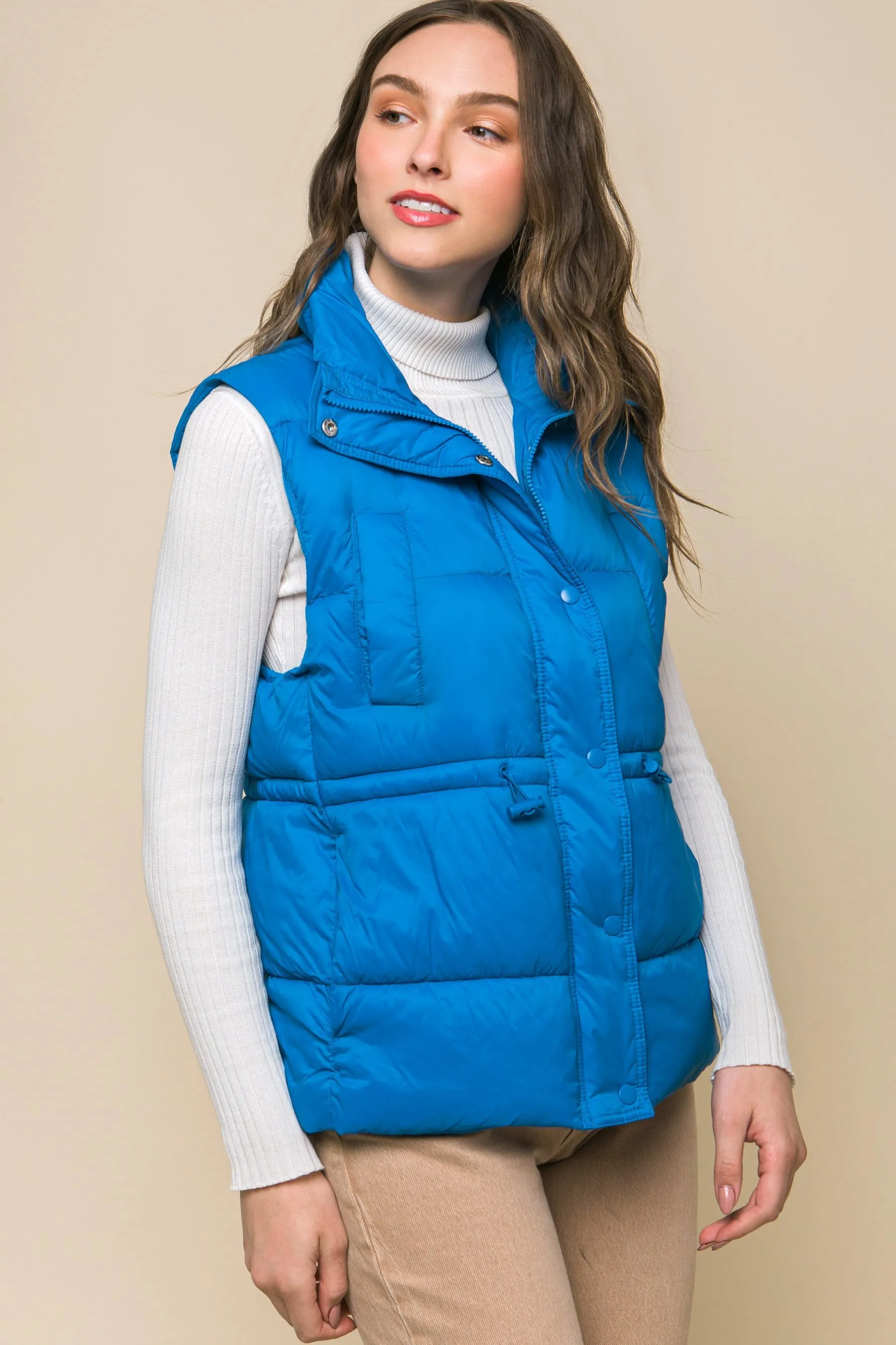 Women's Color Zip up button puffer vest with waist toggles